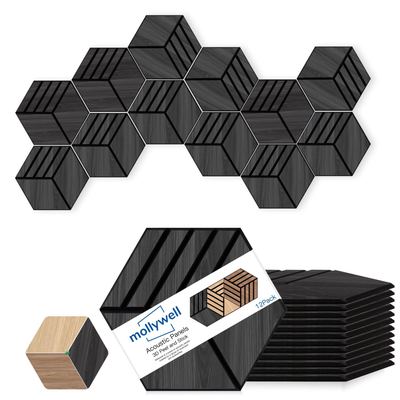 Mollywell Black Oak wood-look hexagon acoustic panels fitted to a living room wall